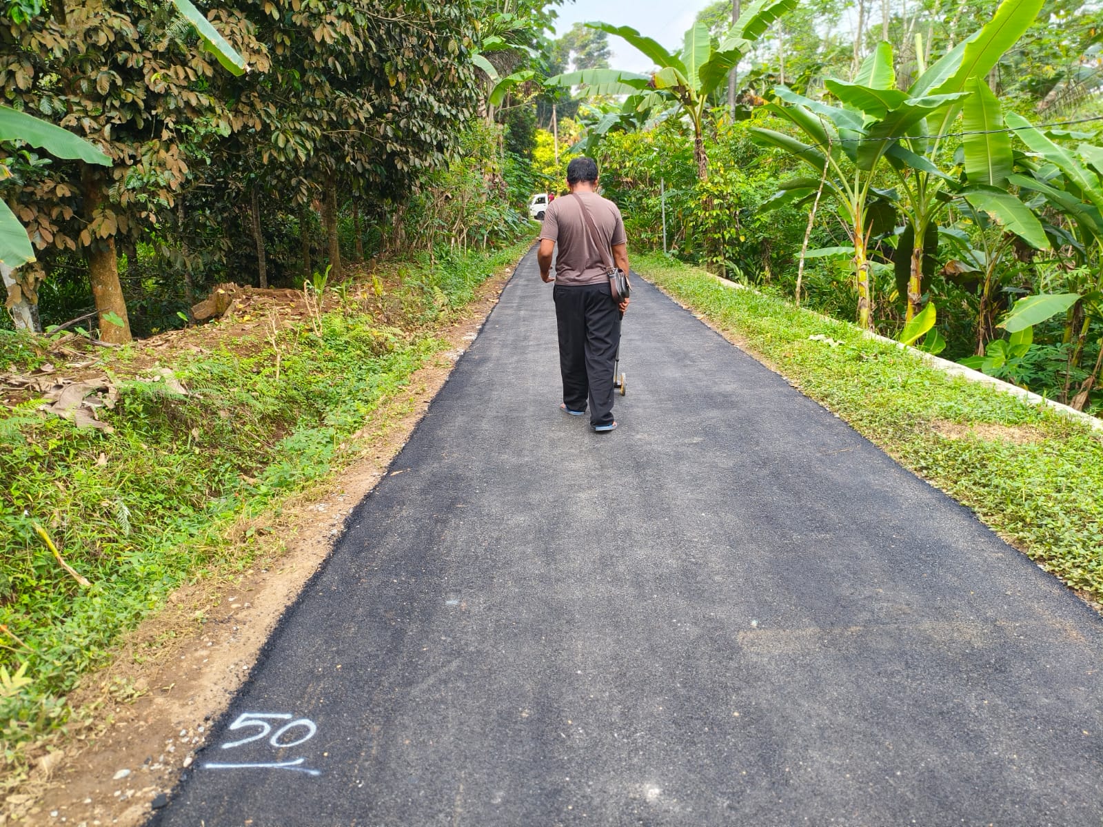 Pengaspalan Jalan Kamal  Desa Punggelan  Kecamatan Punggelan